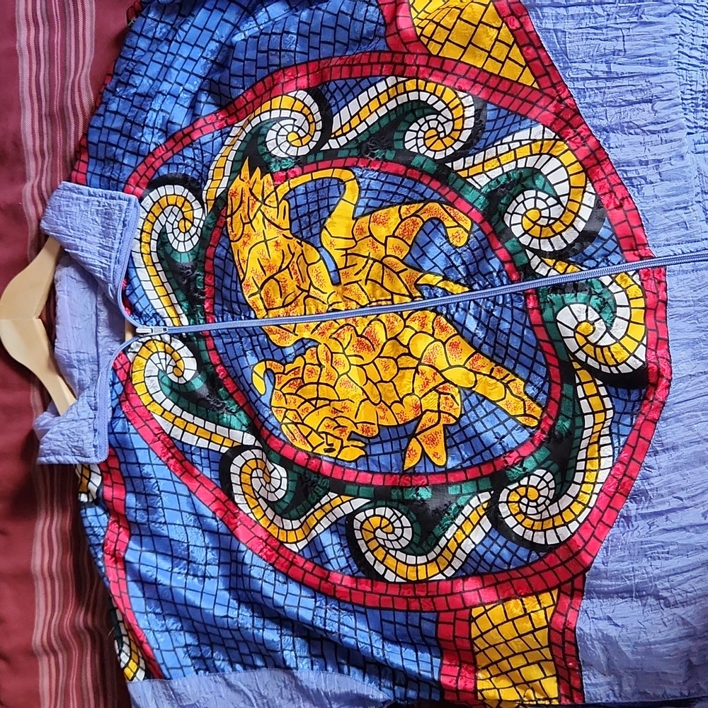 Vintage resort wear. Bright, fantastic stained glass picture on front and back.